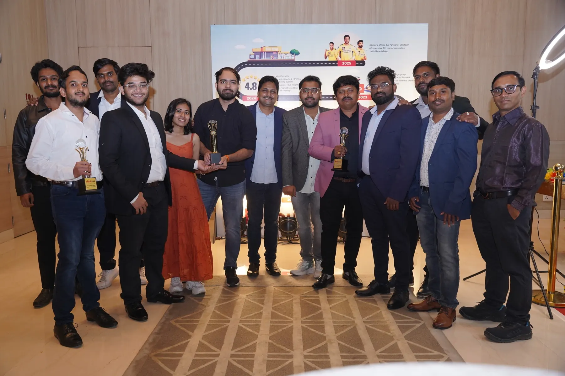AbhiBus team celebrating awards and recognition